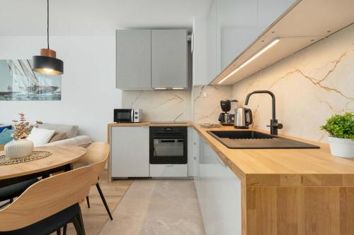 Instalações, Stylish Apartment in a Modern Development Parking & Balcony by Noclegi Renters in Jasien Instalações, Stylish Apartment in a Modern Development Parking & Balcony by Noclegi Renters in Jasien