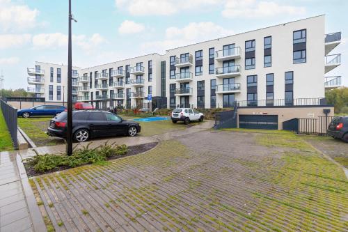 Vista Exterior, Stylish Apartment in a Modern Development Parking & Balcony by Noclegi Renters in Jasien Vista Exterior, Stylish Apartment in a Modern Development Parking & Balcony by Noclegi Renters in Jasien