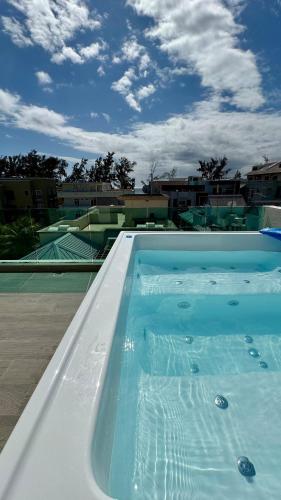 Kolam air panas, 1mn à pied de la plage Superbe penthouse (1mn a pied de la plage Superbe penthouse) in Flic-En-Flac Kolam air panas, 1mn à pied de la plage Superbe penthouse (1mn a pied de la plage Superbe penthouse) in Flic-En-Flac