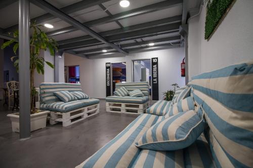 Спільний лаунж/ТБ зона, All Iron Hostel in Бекона Спільний лаунж/ТБ зона, All Iron Hostel in Бекона
