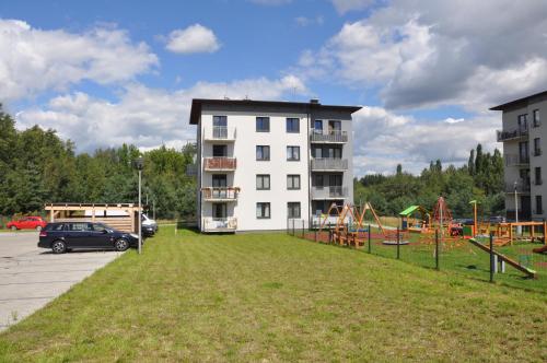 Parque infantil, Apartamenty Tespis - Andersa in Dabrowka Mala Parque infantil, Apartamenty Tespis - Andersa in Dabrowka Mala