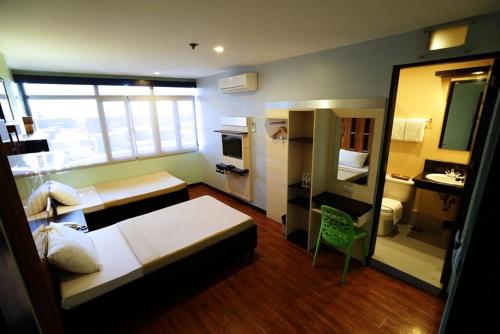 Sugbutel Family Hotel Cebu powered by Cocotel near Robinsons Galleria Cebu Sugbutel Family Hotel Cebu powered by Cocotel near Robinsons Galleria Cebu