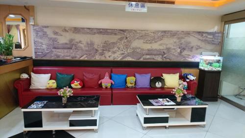 Shared lounge/TV area, Puti Commercial Hotel near Forest and Bird Garden Shared lounge/TV area, Puti Commercial Hotel near Forest and Bird Garden