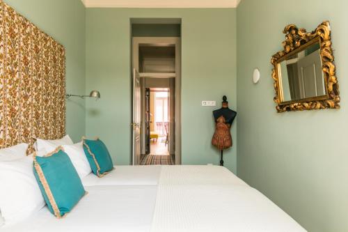 This photo about Almaria - Ex Libris Apartments | Chiado shared on HyHotel.com