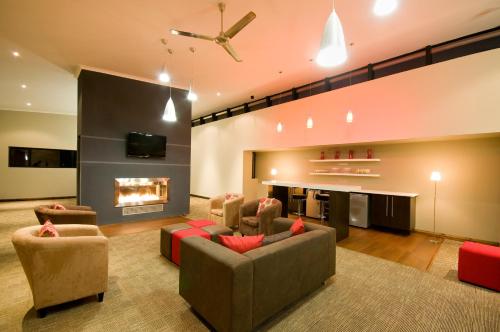 Shared lounge/TV area, The Hub Urban Hotel in Port Elizabeth Shared lounge/TV area, The Hub Urban Hotel in Port Elizabeth
