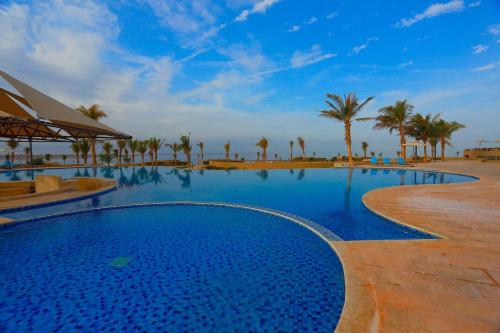 This photo about Golden Tulip Sharma Resort shared on HyHotel.com