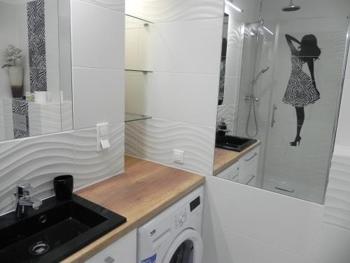 This photo about REINVEST Apartments Krzywoustego shared on HyHotel.com