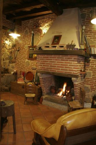 gedeelde lounge/tv-ruimte, Posada La Gatera in Pedro Bernardo gedeelde lounge/tv-ruimte, Posada La Gatera in Pedro Bernardo
