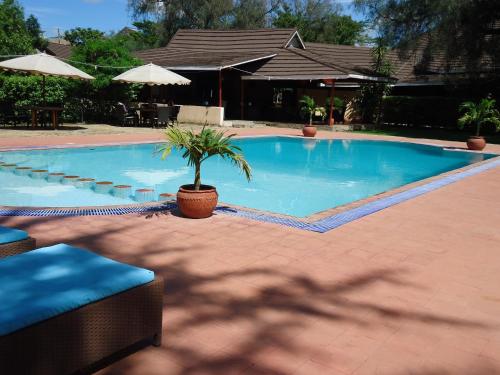 This photo about Sandal Wood Hotel shared on HyHotel.com