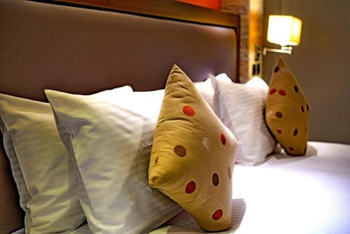 This photo about Magna Hotel and Suites shared on HyHotel.com