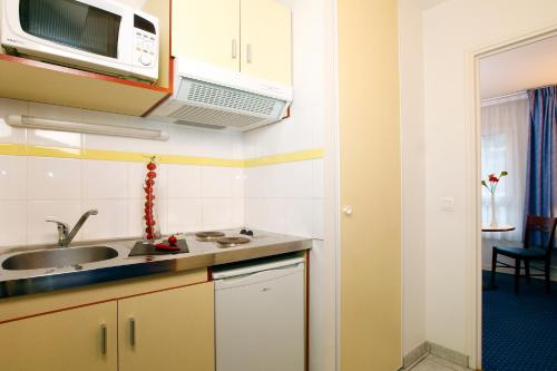 кухня, Appart City Clermont Ferrand Centre in Центр міста Клермон-Ферран кухня, Appart City Clermont Ferrand Centre in Центр міста Клермон-Ферран