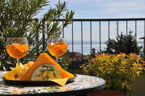Μπαλκόνι/βεράντα, Hotel Astoria in Ντεσεντζάνο Ντελ Γκάρντα Μπαλκόνι/βεράντα, Hotel Astoria in Ντεσεντζάνο Ντελ Γκάρντα