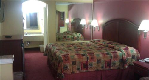 在meiguo.com看到的Scottish Inns Suites East Sam Houston Pkwy North的介绍图片