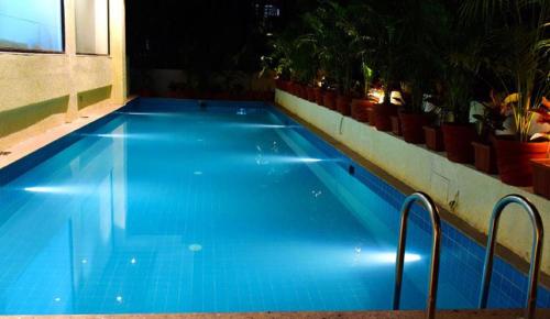 Swimming pool, The Flora Grand in Vasco Da Gama Swimming pool, The Flora Grand in Vasco Da Gama