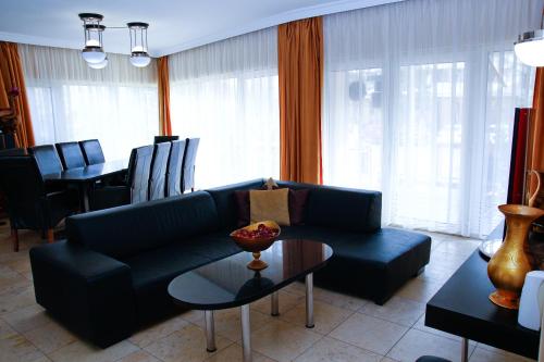Koplietošanas atpūtas telpa ar TV, Princess Apartman in Šiofoka Koplietošanas atpūtas telpa ar TV, Princess Apartman in Šiofoka