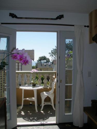 Balcony/terrace, Secret Garden Inn near Poseidon Restaurant-On The Bch Balcony/terrace, Secret Garden Inn near Poseidon Restaurant-On The Bch