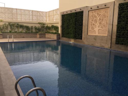 Swimming pool, Lemon Tree Hotel Sector 60 Gurugram in Gurgaon Swimming pool, Lemon Tree Hotel Sector 60 Gurugram in Gurgaon
