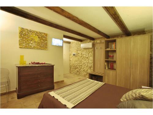 This photo about Residenze Portacastello shared on HyHotel.com