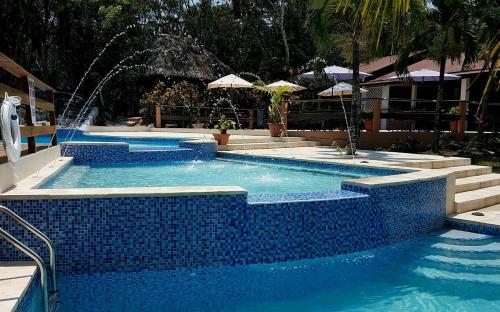Comida y bebida, The Log Cab-Inn in San Ignacio Comida y bebida, The Log Cab-Inn in San Ignacio