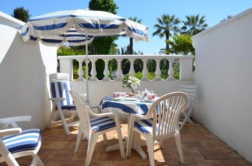 Balcony/terrace, Hotel des Mimosas in Le Fournel Balcony/terrace, Hotel des Mimosas in Le Fournel