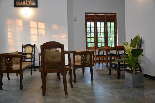 kawasan lounge/TV kongsi, Amsterdam Tourist Rest in Anuradhapura kawasan lounge/TV kongsi, Amsterdam Tourist Rest in Anuradhapura