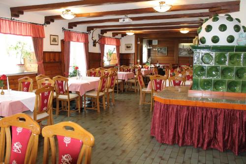 Restaurante, Kirchenwirt Gosau in Gosau Restaurante, Kirchenwirt Gosau in Gosau