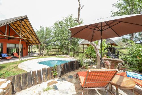 Зовнішній вигляд готелю, Hobatere lodge in Каманжаб Зовнішній вигляд готелю, Hobatere lodge in Каманжаб