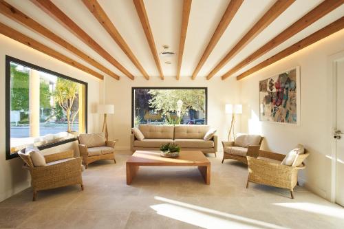 gedeelde lounge/tv-ruimte, Club del Sol Aparthotel in Pollenca gedeelde lounge/tv-ruimte, Club del Sol Aparthotel in Pollenca