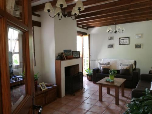 gedeelde lounge/tv-ruimte, Casa Fidela in Pesaguero gedeelde lounge/tv-ruimte, Casa Fidela in Pesaguero