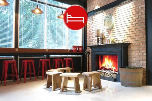 Shared lounge/TV area, The Bed KLCC near Bukit Nanas Monorail Station Shared lounge/TV area, The Bed KLCC near Bukit Nanas Monorail Station