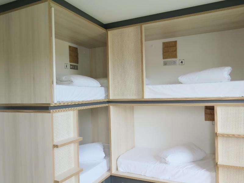 Bed in 4-Bed Mixed Dormitory Room with Private Bathroom image 1