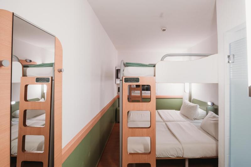 Friends Room with Two Bunk Beds & Two Single Beds image 1