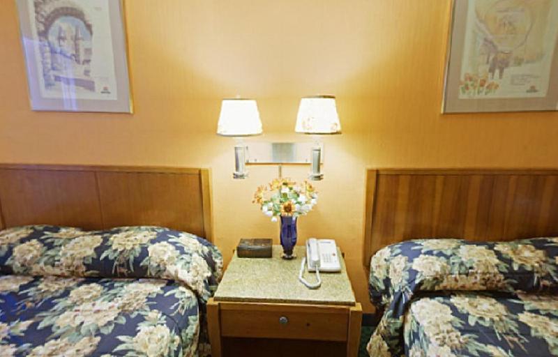 Room with Two Double Beds image 1