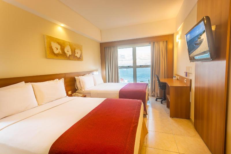 Superior Room with Two Double Beds and Sea View image 3