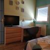 Chambre Chaleureuse chez l'habitant