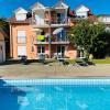 Das Schneckenhaus - Ferienwohnung mit Pool & Seeblick