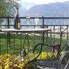 VILLA LAGO FOREGORUND Lakeview Winter Retreat Three-Bedroom Apartment with Balcony