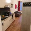 Vibrant Red Apartment I contactless Check-In