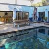 Contemporary house with heated pool in a magnificent pine forest