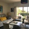 Large Apartment with a large garden and a swimming pool in the residence