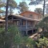 Maison bois dans la forêt de Carcans-plage