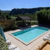 Cosy gîte with magnificent view, private terrace and shared swimming pool