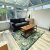 OnSiteStays - Ideal Long Term Retreat, 2-BR House with Conservatory, Parking & Wi-Fi