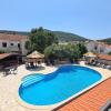 Red House Apartment With Swimming Pool