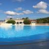 T2 rez de villa avec piscines