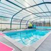 Villa de 5 chambres avec piscine privee jardin clos et wifi a Ranville a 8 km de la plage