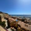 Sunrise Beachfront Apartment by the Marina