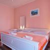 Apartment and Rooms Toka