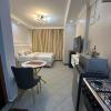 Pamoja stays - Modern studio near transit with balcony and workspace