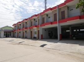 RedDoorz near Jalan Kolonel Haji Burlian Palembang, hotel v destinaci Palembang